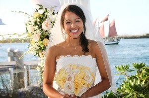New bride with beautiful smile after smile makeover using financing options